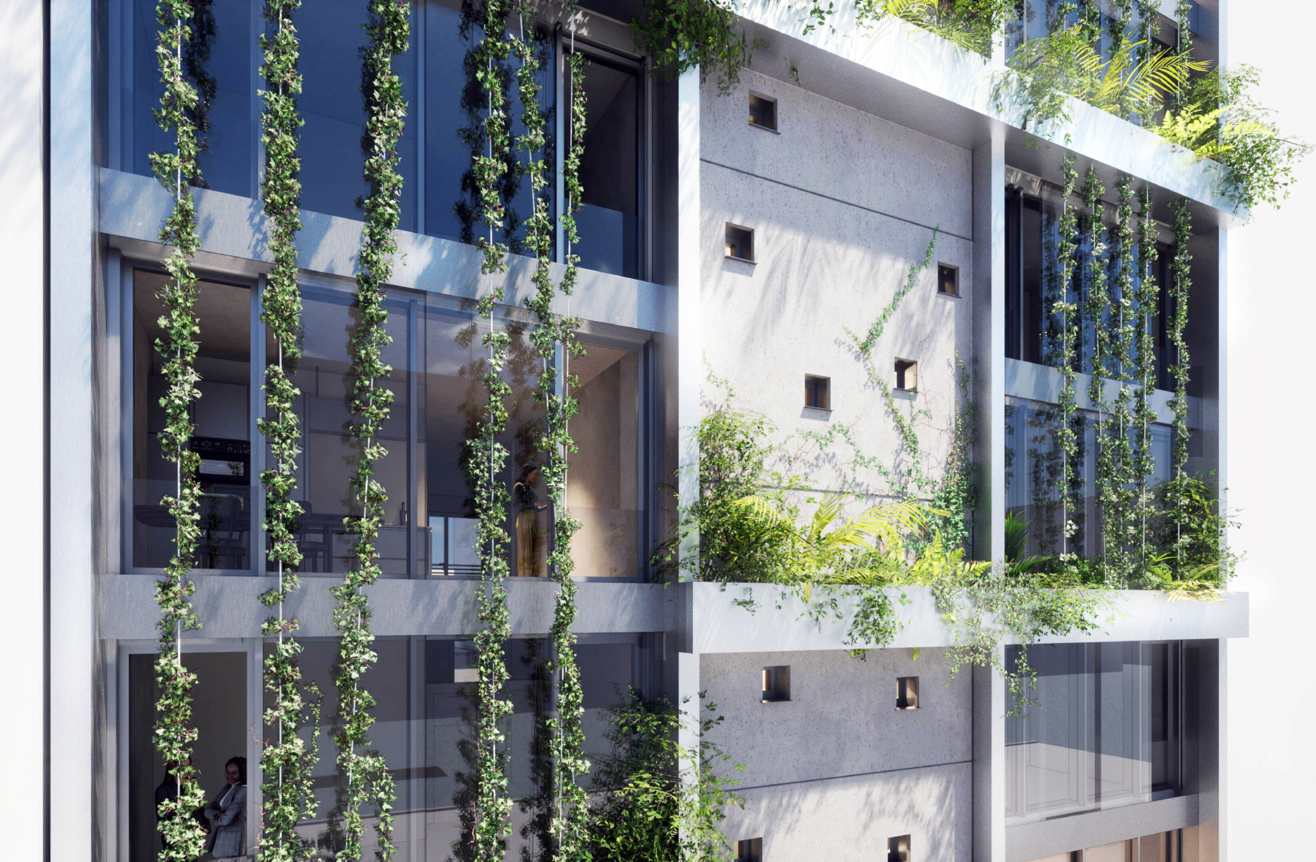 Fassadenansicht eines modernen Gebäudes mit großen Fenstern und vertikal hängenden grünen Pflanzen